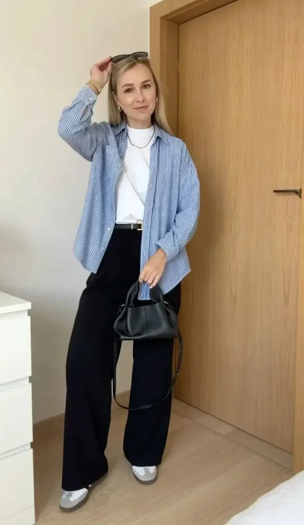 From Early Classes to Late Coffee Runs: 15 College Fall Outfits 9 Striped Oxford Shirt With Black Jeans