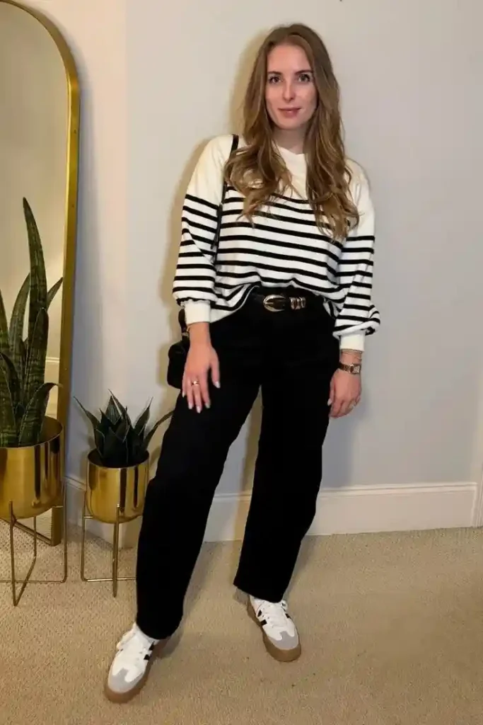 Cozy Meets Chic: 14 Fall Sweater Outfits You’ll Want to Wear on Repeat 4 Striped Sweater With Black Jeans