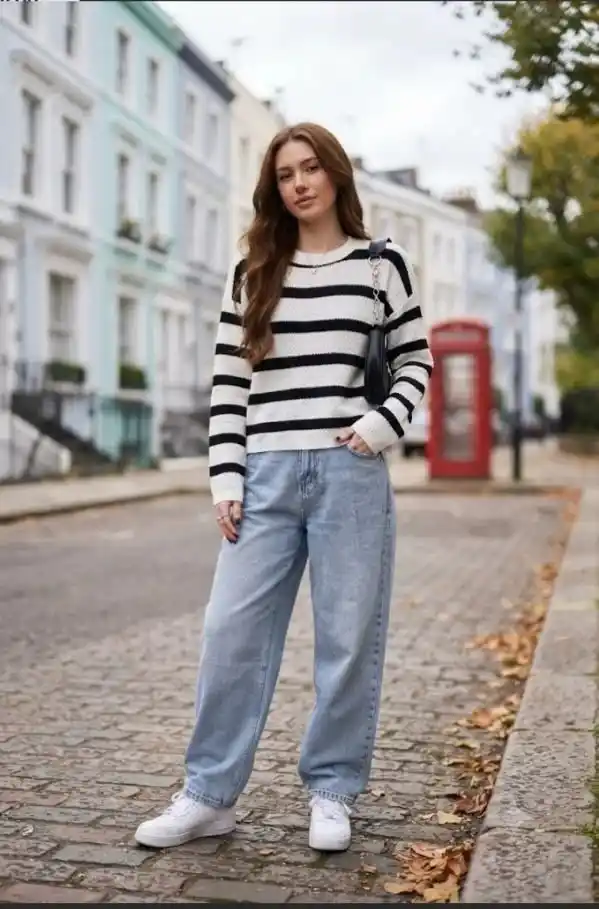 15 Casual Fall Outfits That Make Everyday Dressing Feel Effortless 12 Striped Sweater With Relaxed Jeans