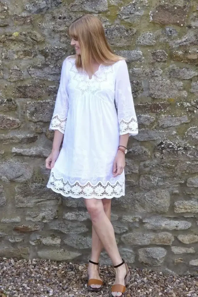 Your Closet Will Feel Brand-New with These 16 Dress Outfit Ideas 12 White Dress with Tan Accessories