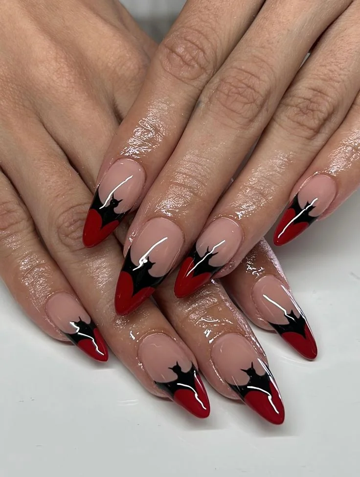 Fall Gets Spooky With These 19 Fall Halloween Nails You’ll Want to Copy 8 Burgundy Bat Nails