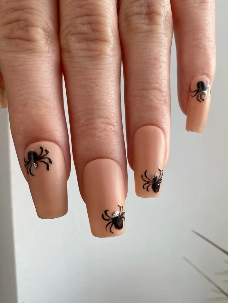 Fall Gets Spooky With These 19 Fall Halloween Nails You’ll Want to Copy 14 Caramel Spider Nails