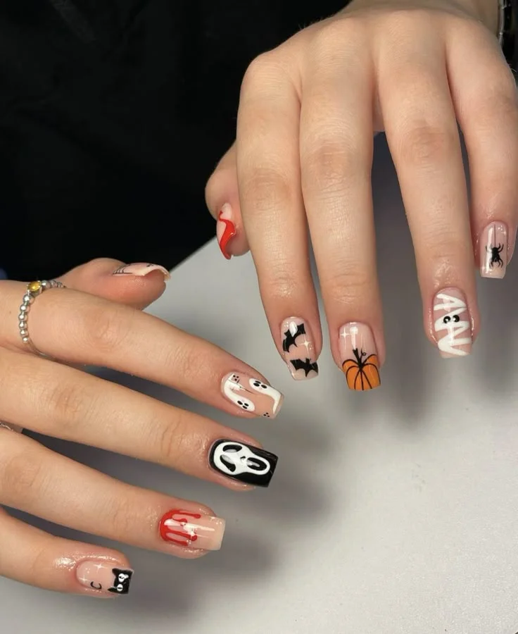Fall Gets Spooky With These 19 Fall Halloween Nails You’ll Want to Copy 20 Mixed Halloween Fall Nails