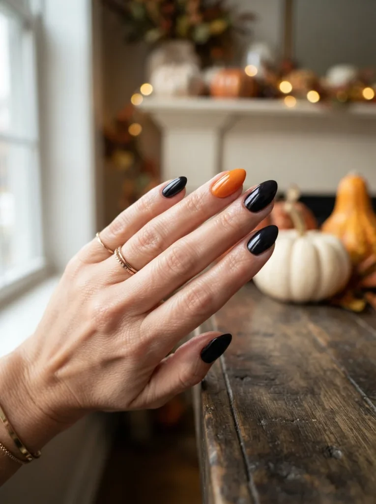 15 Simple Halloween Nails You Can Finish Before Your Tea Gets Cold 6 Single Orange Accent Nail