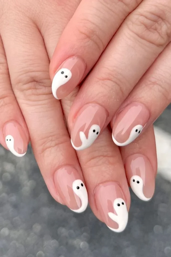 Fall Gets Spooky With These 19 Fall Halloween Nails You’ll Want to Copy 5 Tiny Ghost French Tips