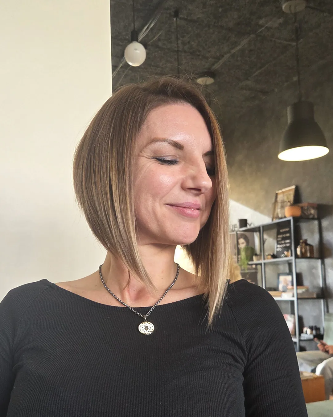 13 Easy Short Hairstyles That'll Make You Look Like You Walked Straight Out of a Fashion Magazine 9 Asymmetrical Bob