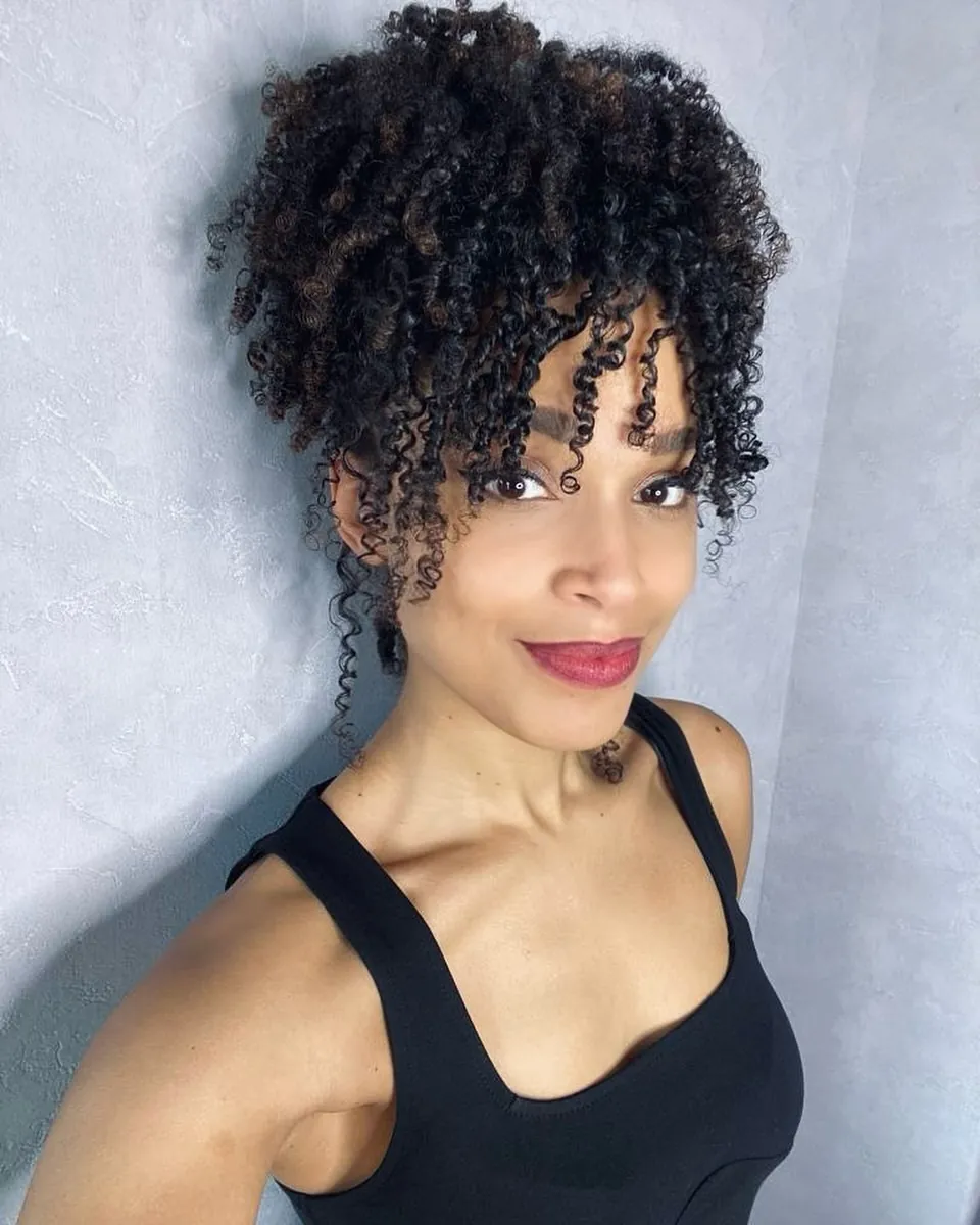 13 Natural Hairstyle Ideas That'll Make You Fall in Love With Your Hair All Over Again 2 High Puff — Classic