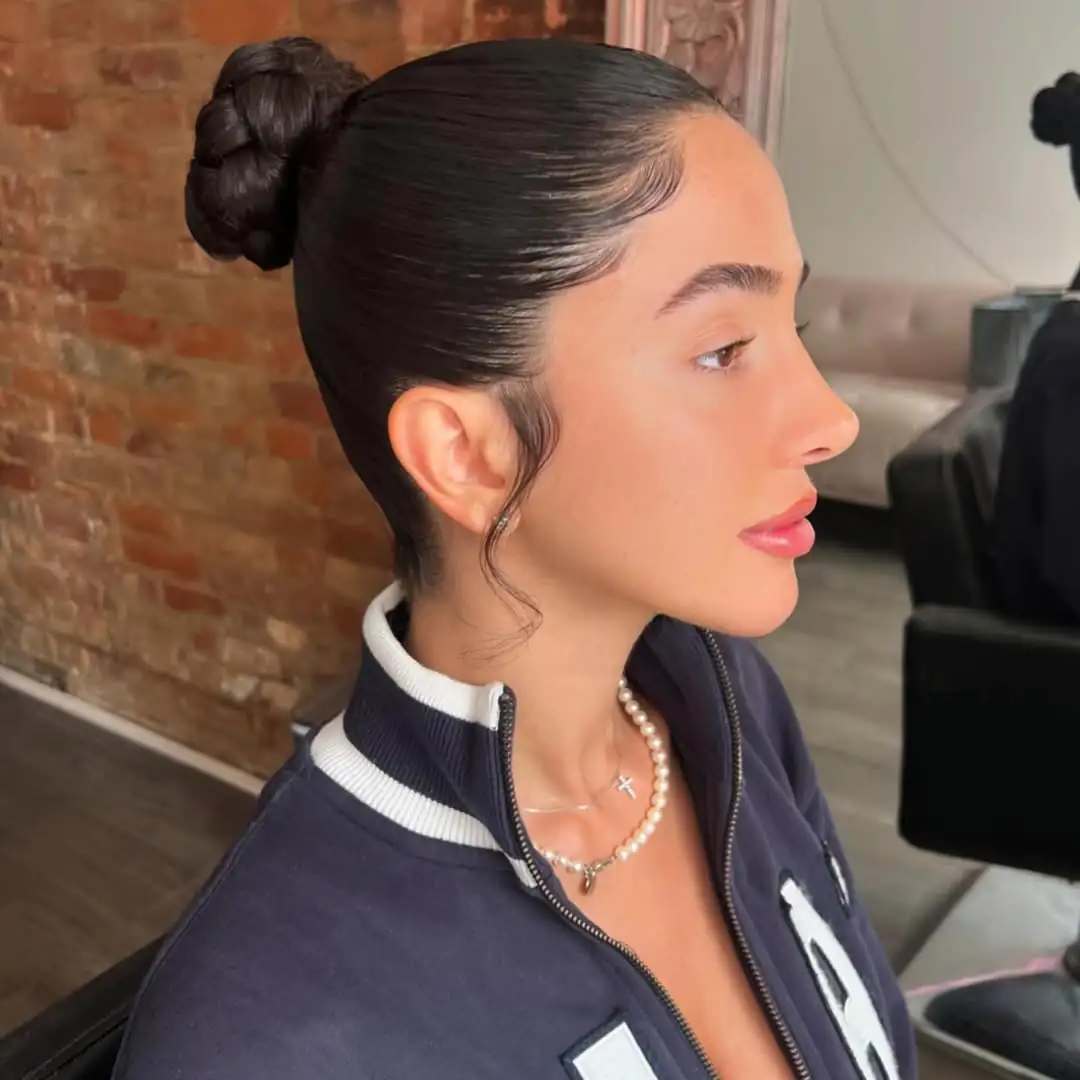 14 Middle Part Hairstyles Ideas That’ll Make You the Hair Icon of 2026 (Bye, Side Part Drama!) 7 Slicked-Back Middle Part Bun