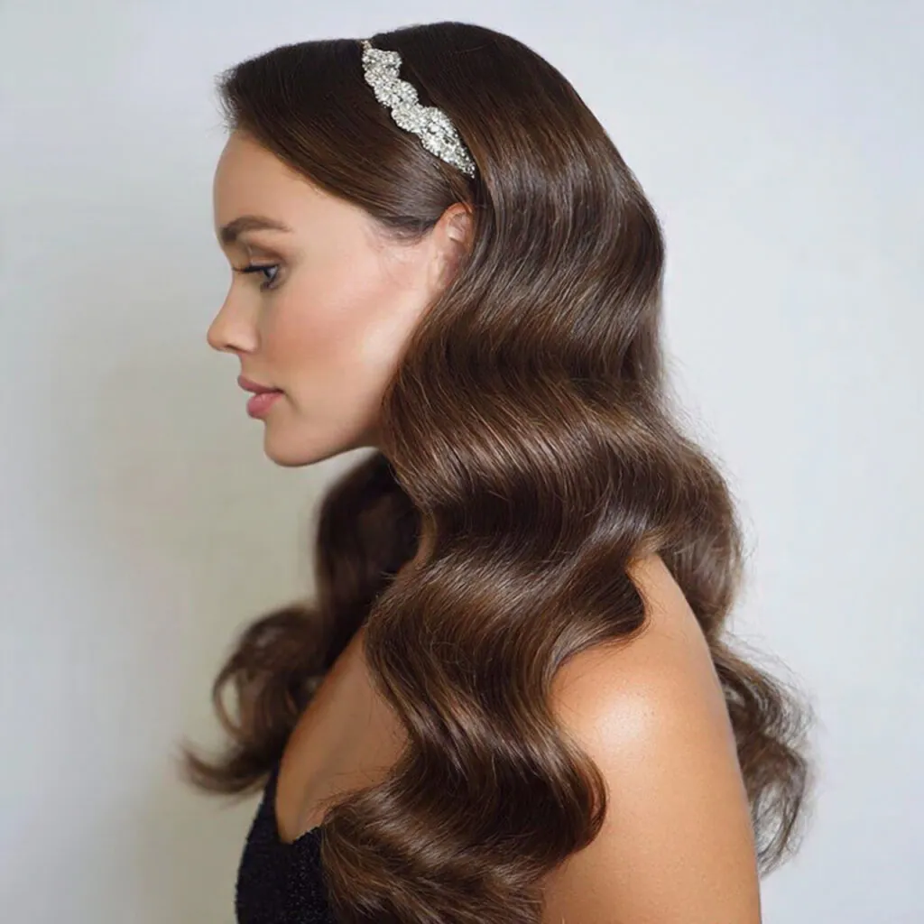 13 Wedding Guest Hairstyles That Look Expensive, Stay Put, and Photograph Like a Dream 2 soft hollywood waves for wedding guest hairstyles