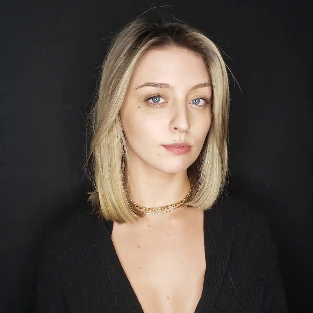 14 Shoulder-Length Hairstyles Ideas That Will Instantly Upgrade Your Look (Yes, Even on Lazy Hair Days) 2 Classic Blunt Lob