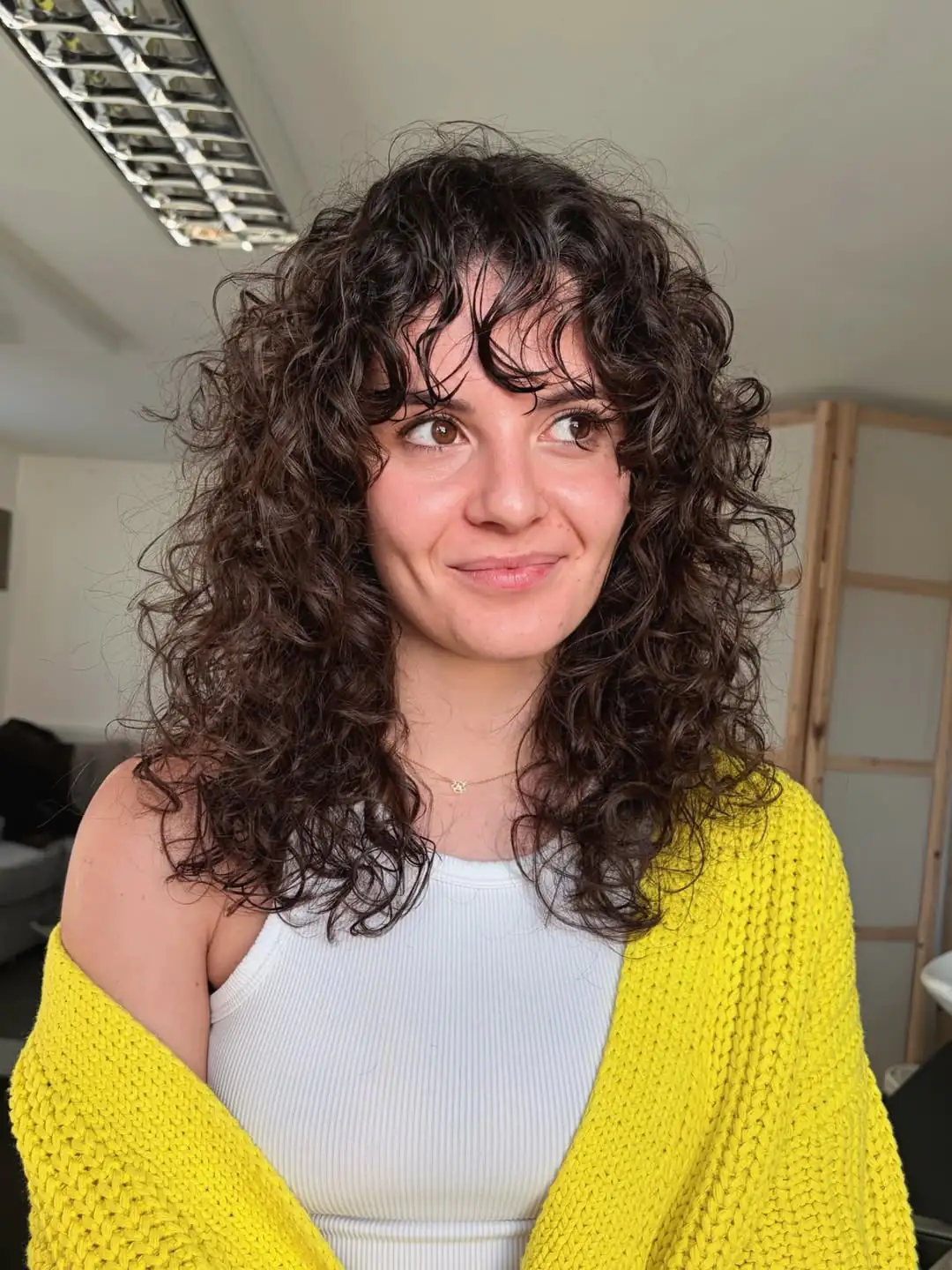 15 Fringe Hairstyles Ideas That’ll Instantly Make You Look Cooler (Like, Effortlessly Cool) 6 Curly Fringe