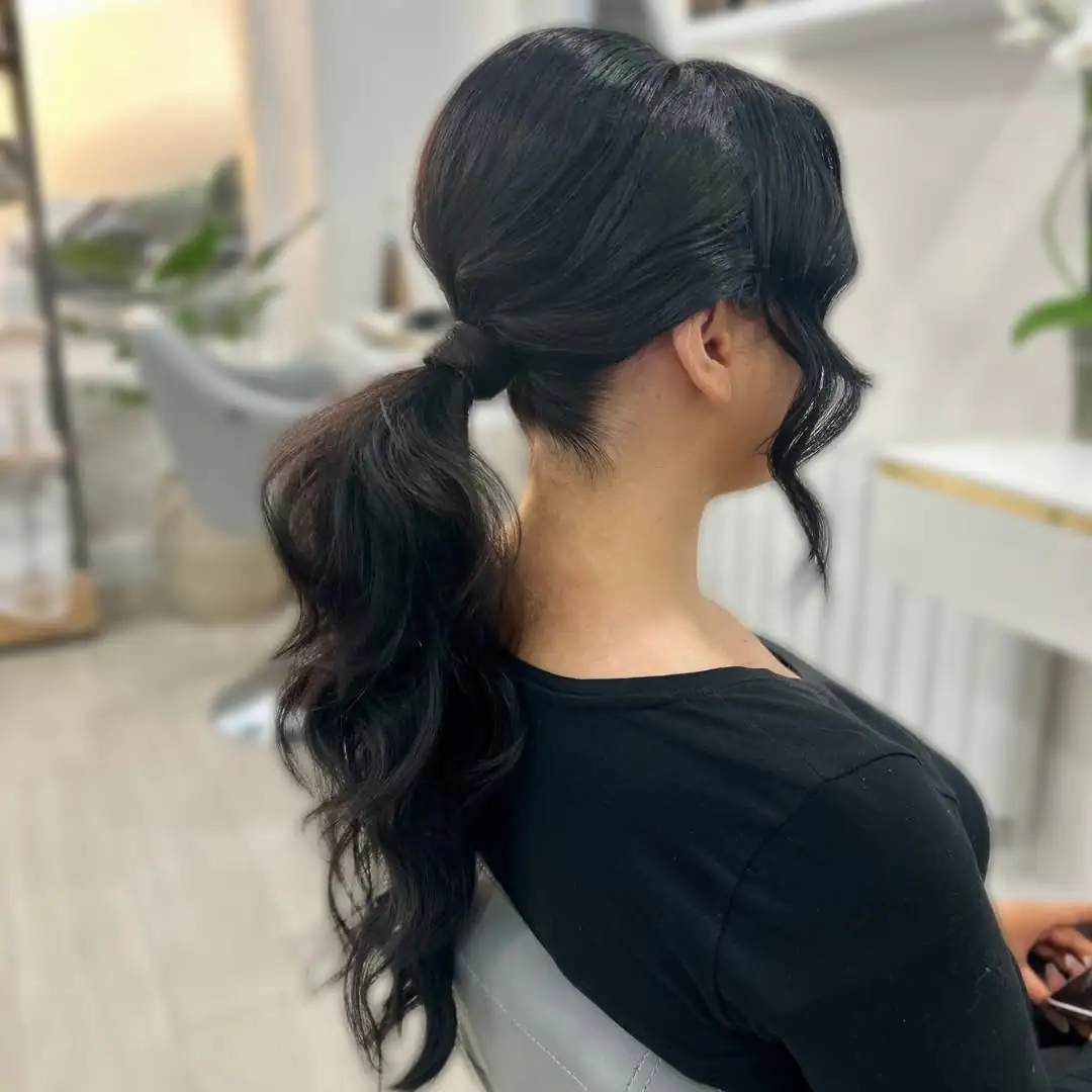 14 Party Hairstyles Ideas That Will Make You the Main Character (Yes, Even at Someone Else’s Party) 10 Low Textured Ponytail