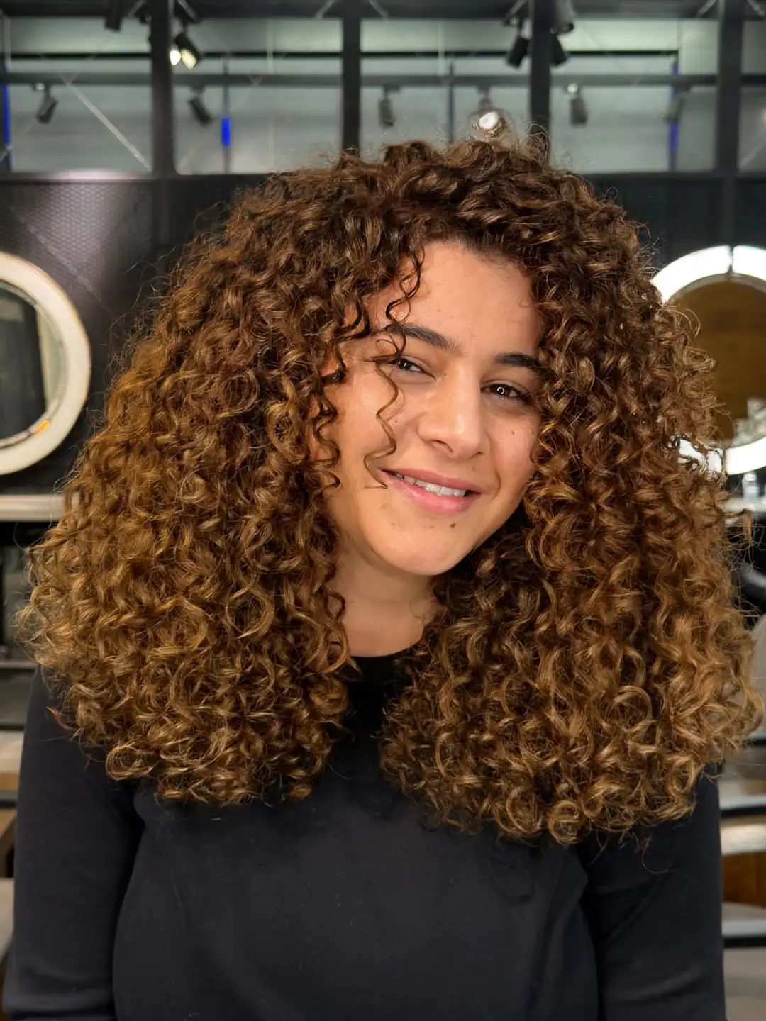 16 Short Curly Hairstyles for Women That Are Basically Effortless Chic 11 Messy Curly Crop
