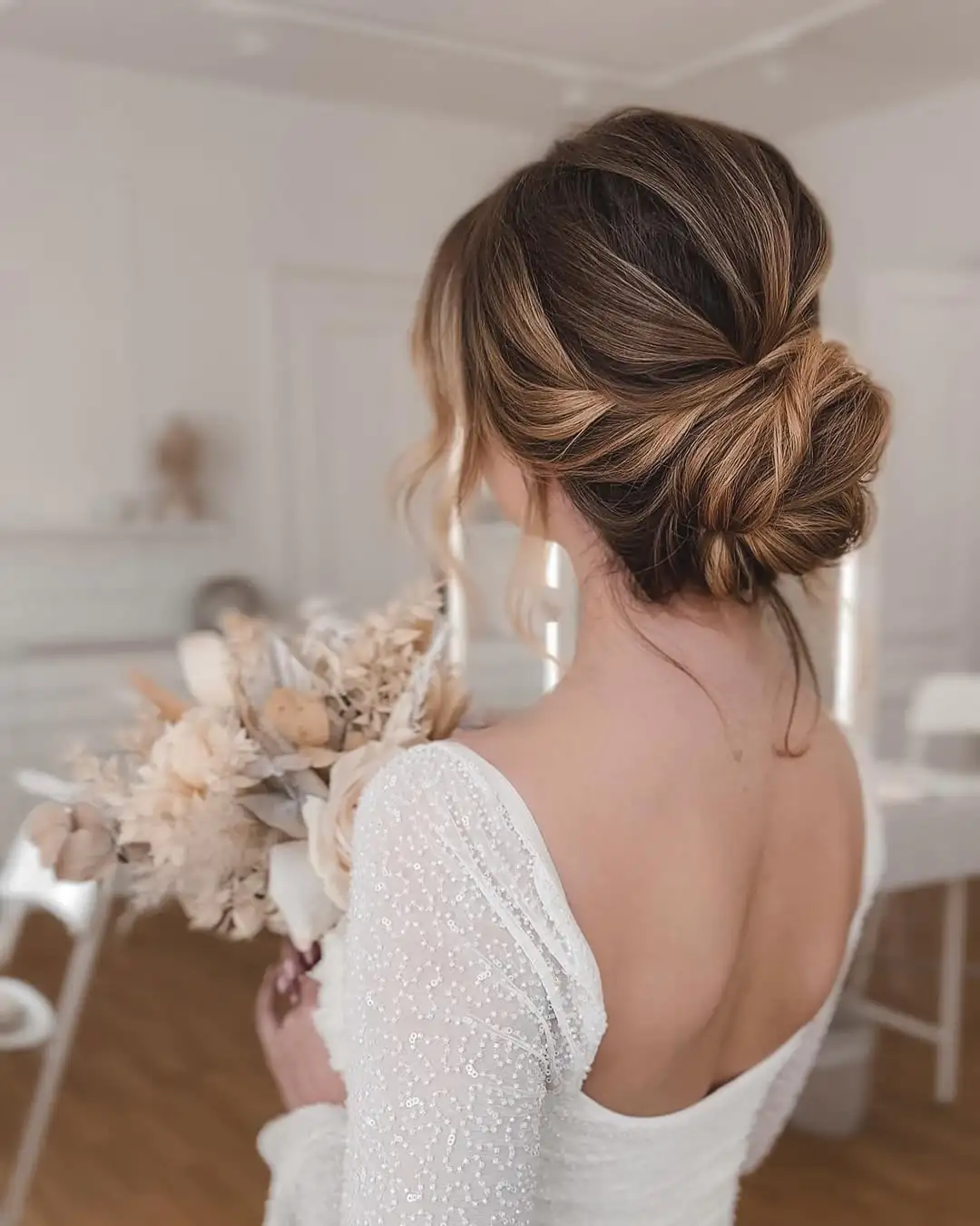 16 Easy Hairstyles for Thick Hair That Will Instantly Upgrade Your Look (Zero Stress, All Style) 2 Messy Low Bun