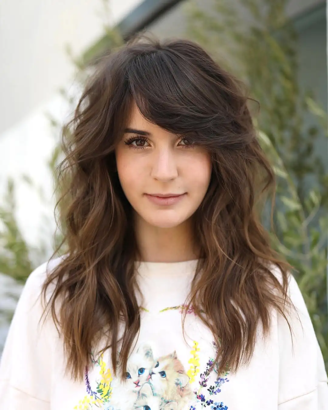 15 Unexpected Hairstyles With Bangs That Are Taking Over Pinterest 9 Messy bun with side bangs