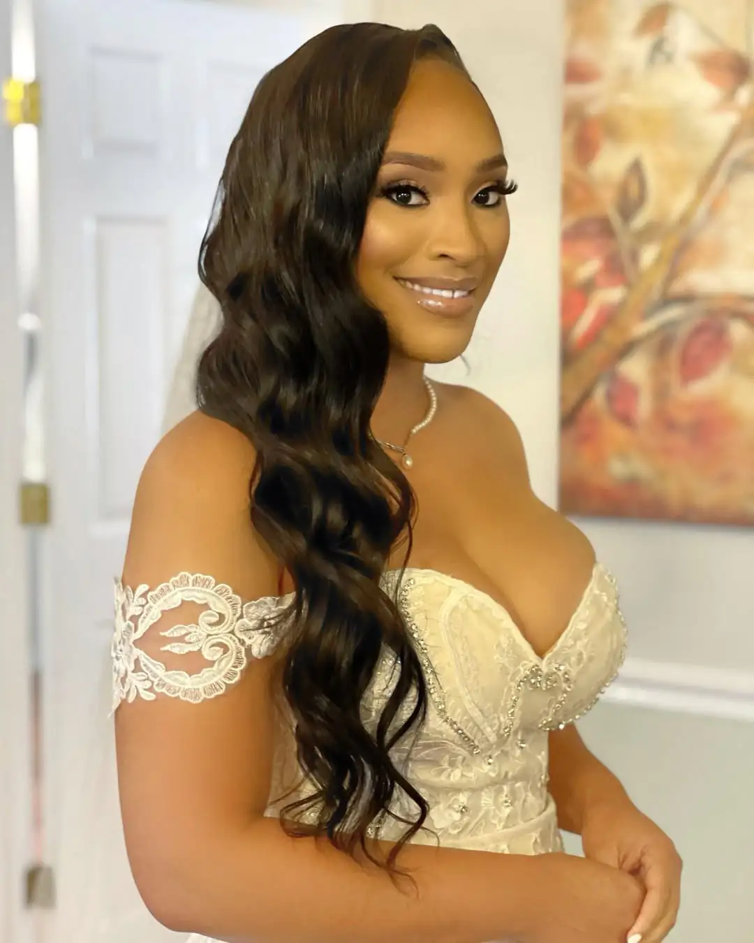 16 Curly Prom Hairstyles That Will Have You Serving Main Character Energy All Night 5 Side-Swept Curls