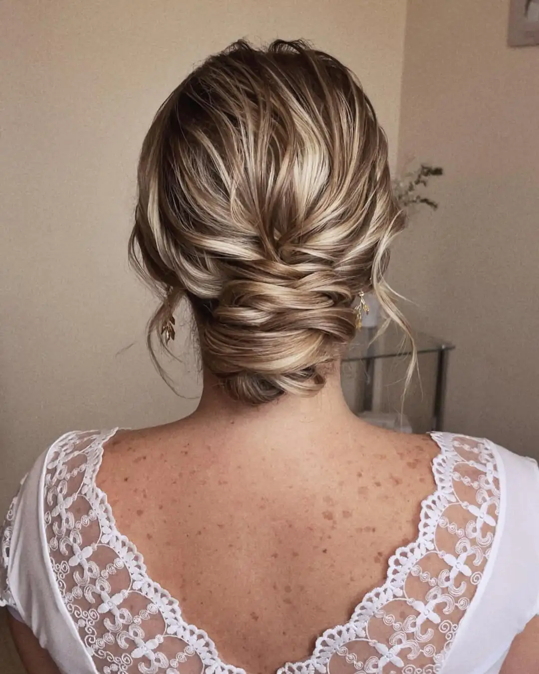 14 Wedding Hairstyles for Long Hair That’ll Have You Feeling Like That Girl 3 The Low Textured Bun