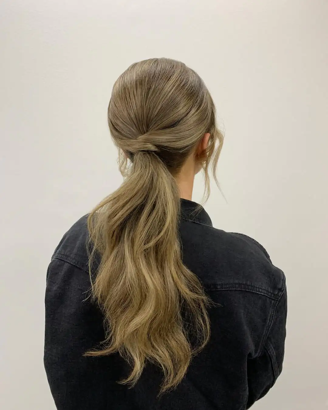 16 Easy Hairstyles for Thick Hair That Will Instantly Upgrade Your Look (Zero Stress, All Style) 13 Twisted Low Pony