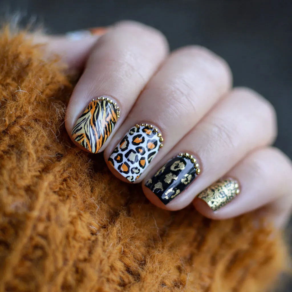 16 Summer Nails for Kids That Are So Cute You’ll Want Them Too 13 animal print fun nails