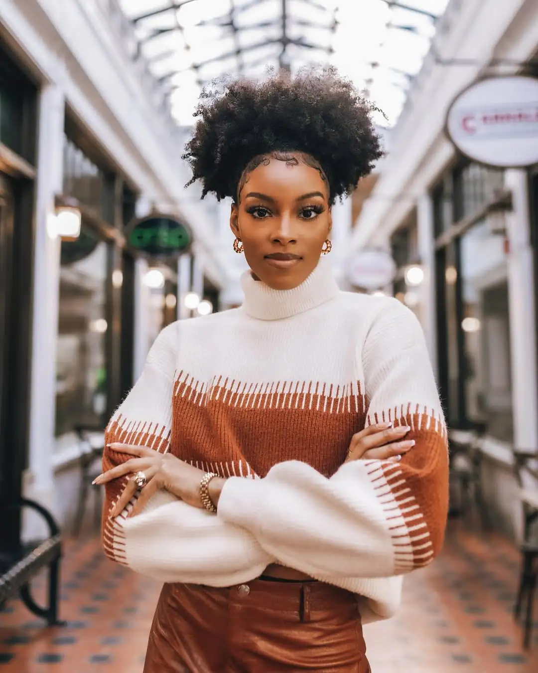 17 Curly Braided Hairstyles That Will Instantly Upgrade Your Look (Yes, Even on Lazy Hair Days) 11 Cornrows with Curly Puff