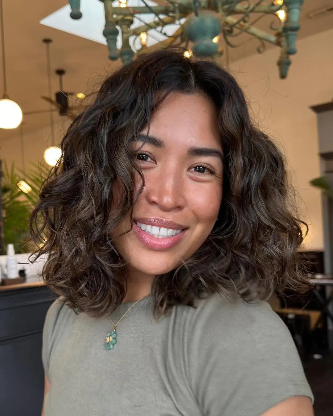 15 Curly Hairstyles for Medium Hair That Will Make You Ditch Your Straightener (Finally) 8 Curly Lob with Bangs