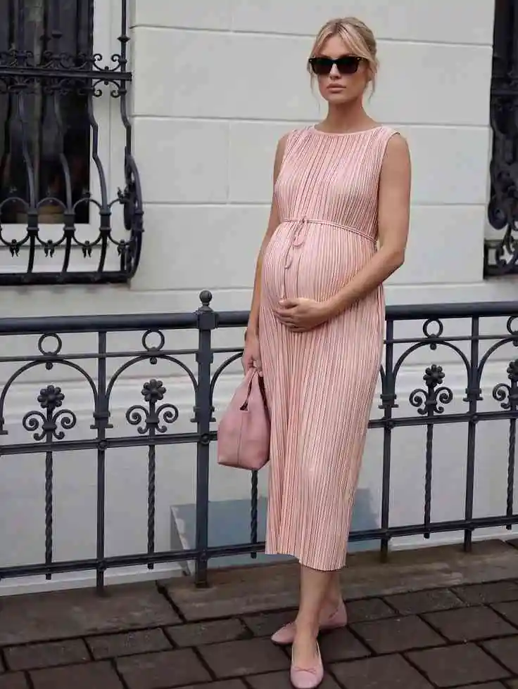 Cozy Looks That Make Room for You: 14 Pregnant Fall Outfits 15 Draped Maternity Maxi Dress With Metallic Flats